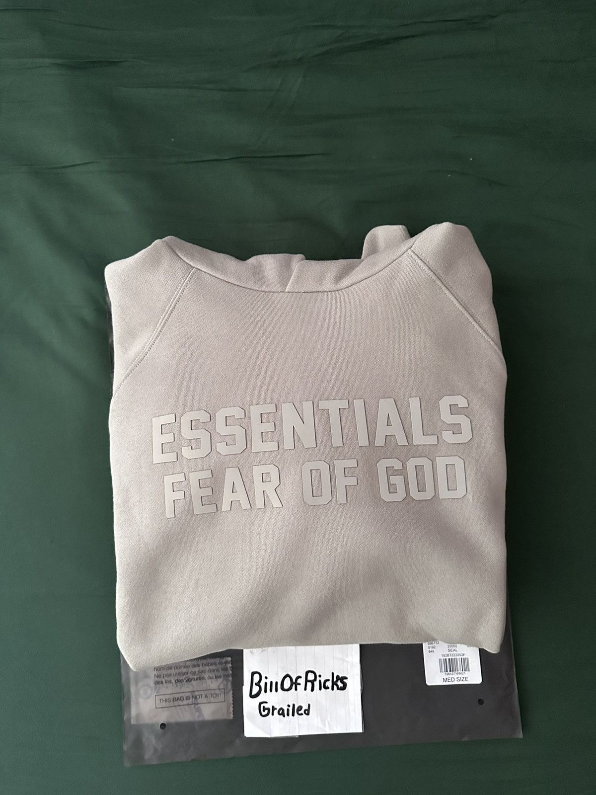 Fear of God Essentials X Fear Of God Raglan Hoodie Seal March 2023 Drop ...