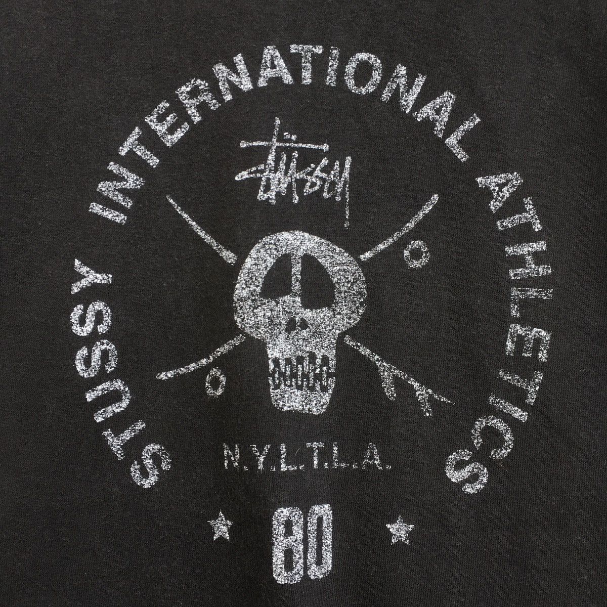 image of Made In USA x Stussy Sun Faded Vintage Stussy International Long Sleeve in Uneven Sun Faded Black (