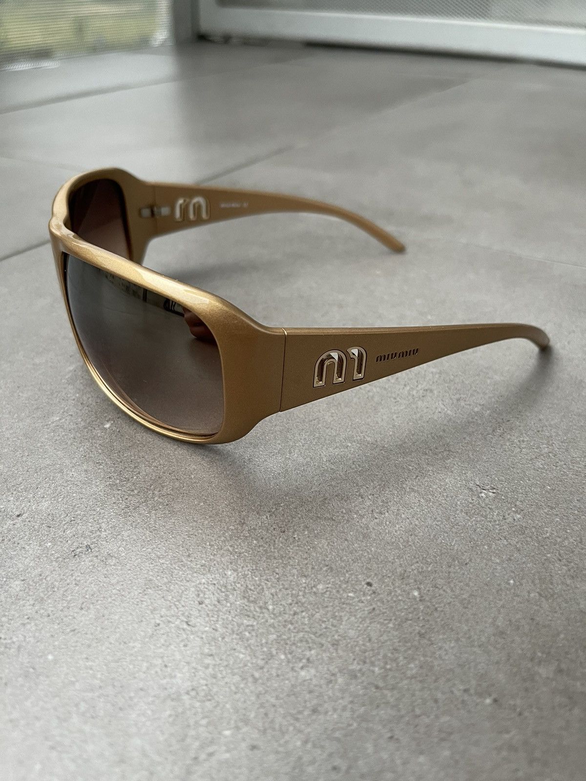 Prada !DS! Miu Miu SMU08H 7PO-7K1 Shiny Gold Sunglasses Size ONE SIZE - 1 Thumbnail