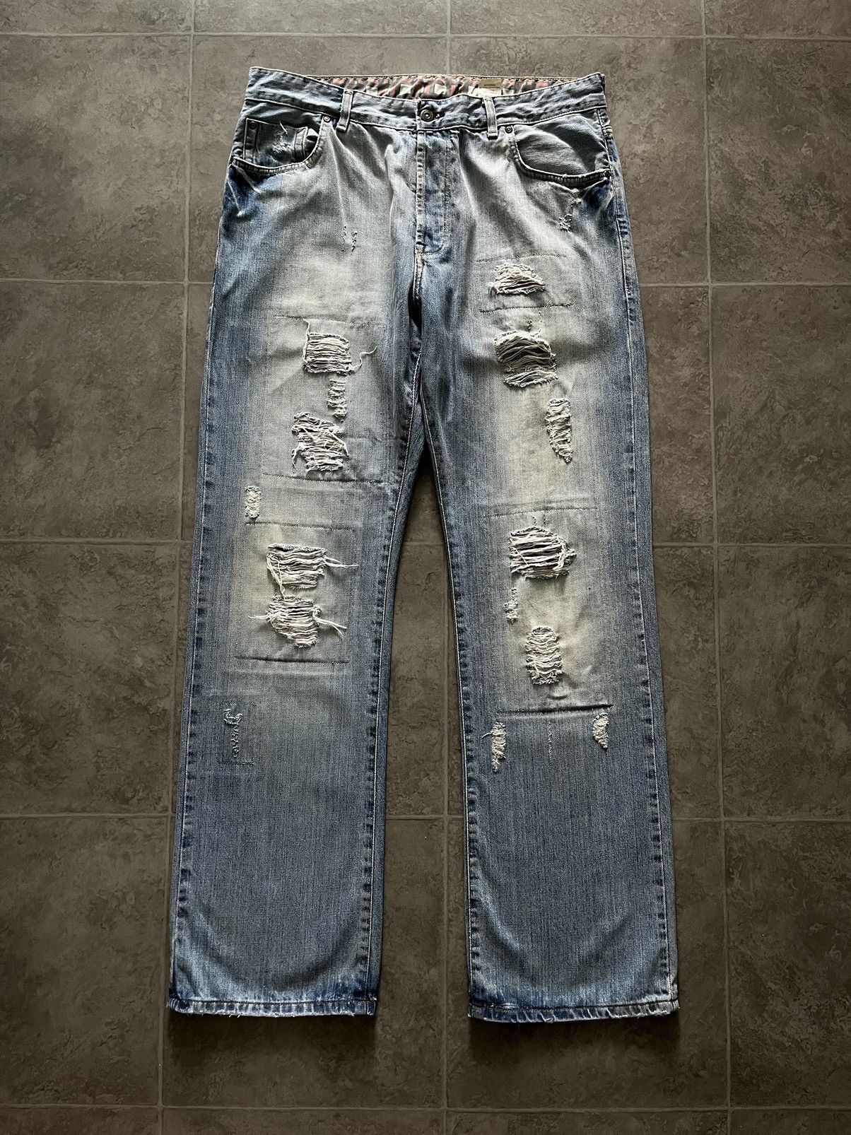 Vintage DISTRESSED AND PATCHED VINTAGE WIDE LEG JEANS Y2K | Grailed